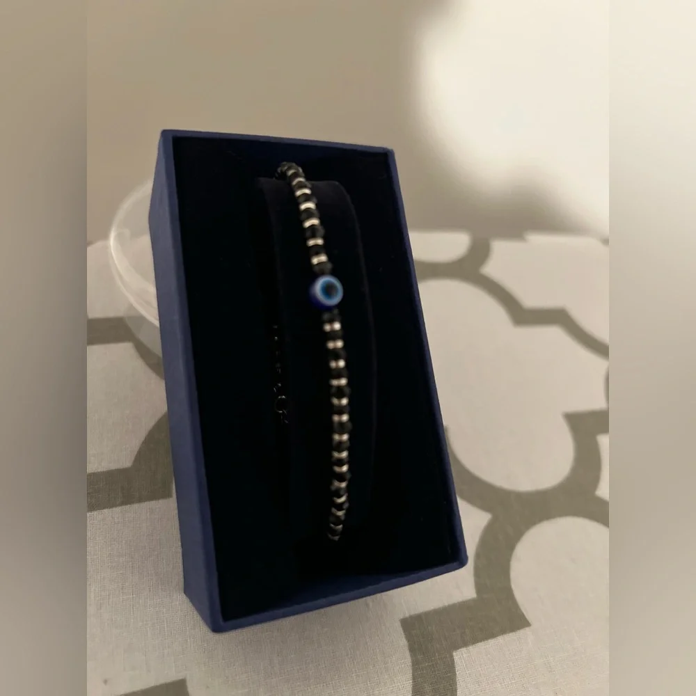 Sterling silver evil eye bracelet with black crystals NWOT